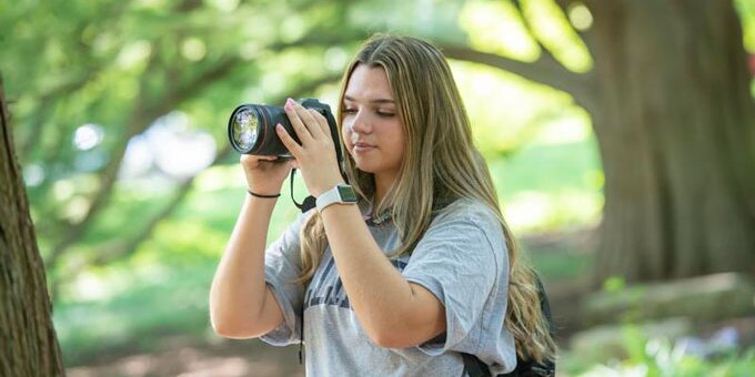 Student taking pictures