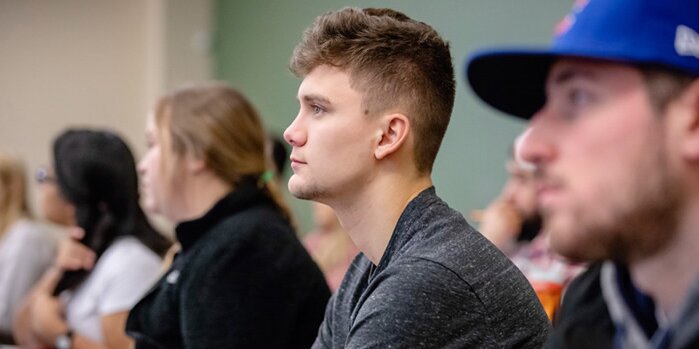 Man sitting in class